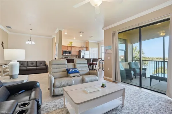 a living room with furniture and a table