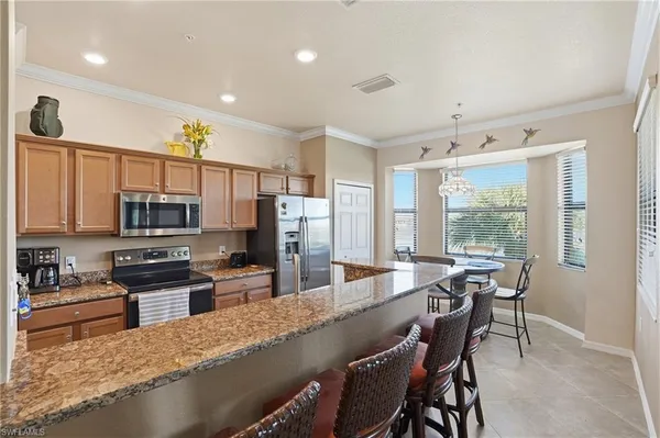 a kitchen with granite countertop a sink and counter space