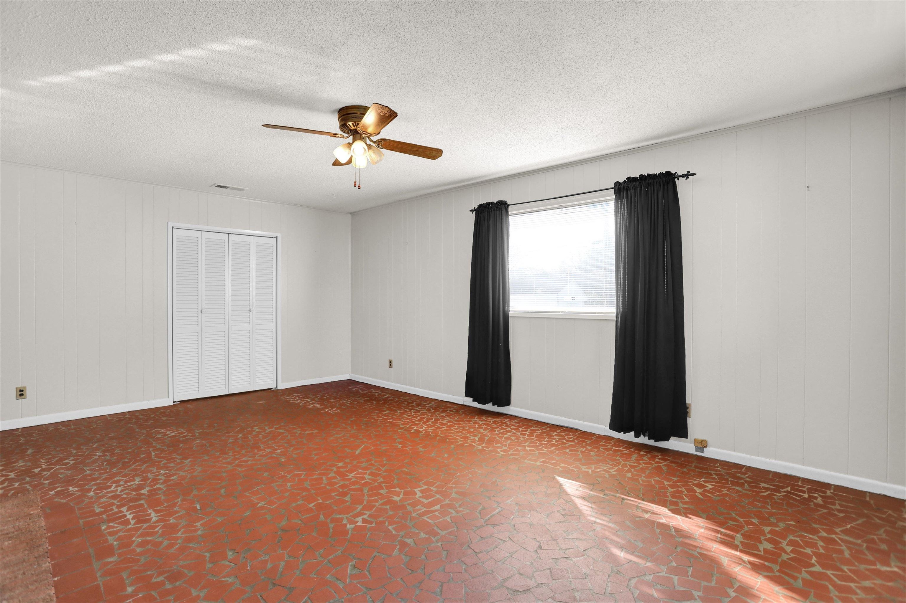 4931 Owen Road Memphis, TN 38122 - Photo 15 of 24 Spare room with visible vents, ceiling fan, and baseboards