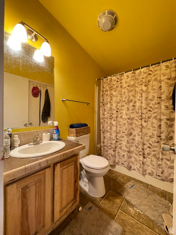 240 Horseshoe Bend Road Vernal, UT 84078 - Photo 24 of 41 Full bathroom featuring vanity, a textured wall, and shower / bath combo