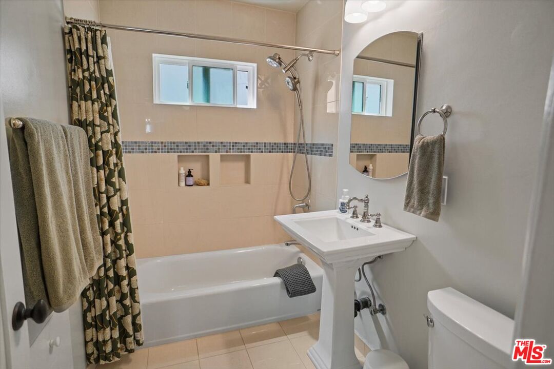 2400 Sylvan Lane Glendale, CA 91208 - Photo 13 of 28 a bathroom with a sink toilet and shower