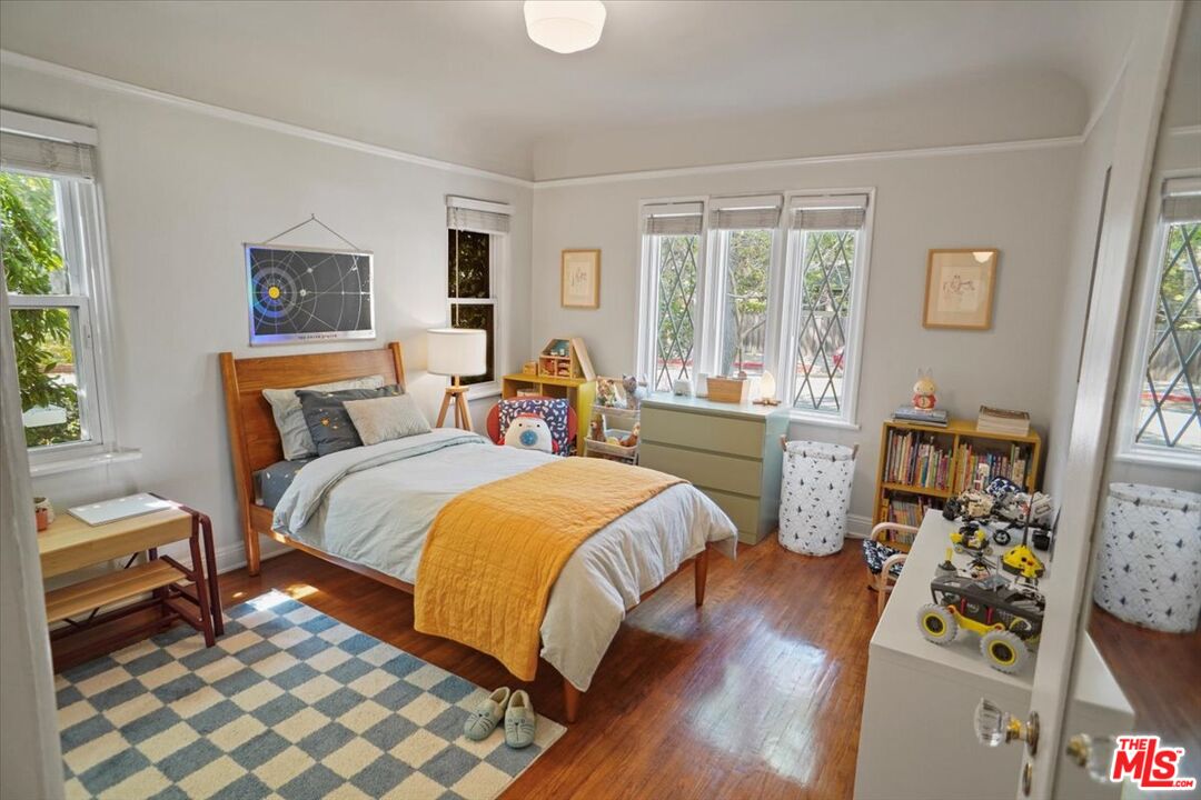 2400 Sylvan Lane Glendale, CA 91208 - Photo 14 of 28 a bedroom with a bed and wooden floor