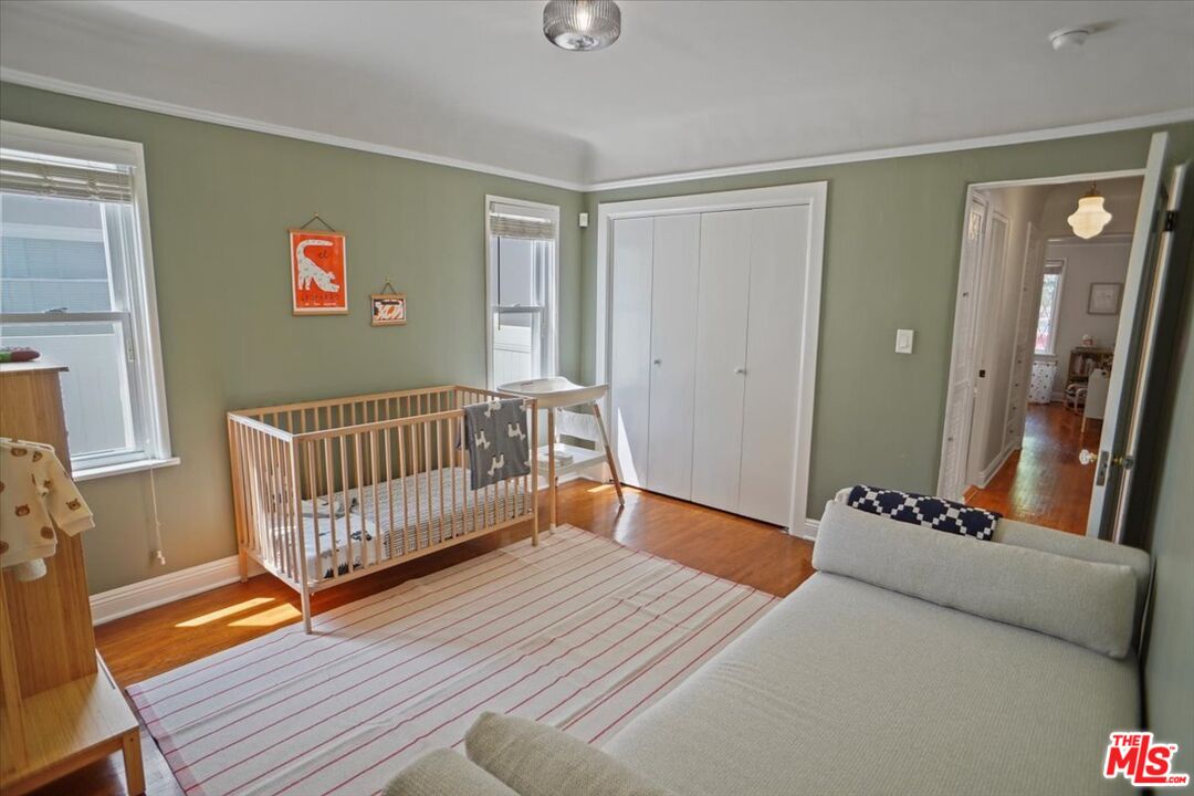 2400 Sylvan Lane Glendale, CA 91208 - Photo 15 of 28 a bedroom with furniture and wooden floor
