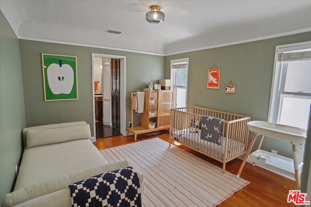 2400 Sylvan Lane Glendale, CA 91208 - Photo 16 of 28 a bedroom with furniture and a window