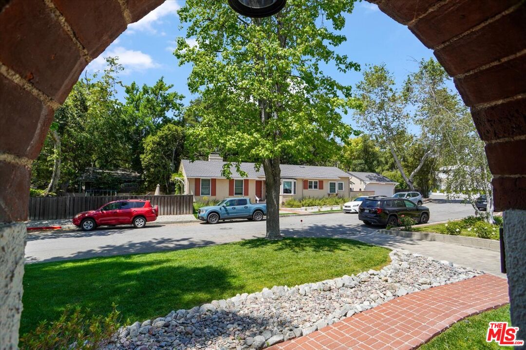 2400 Sylvan Lane Glendale, CA 91208 - Photo 21 of 28 a front view of a house with garden
