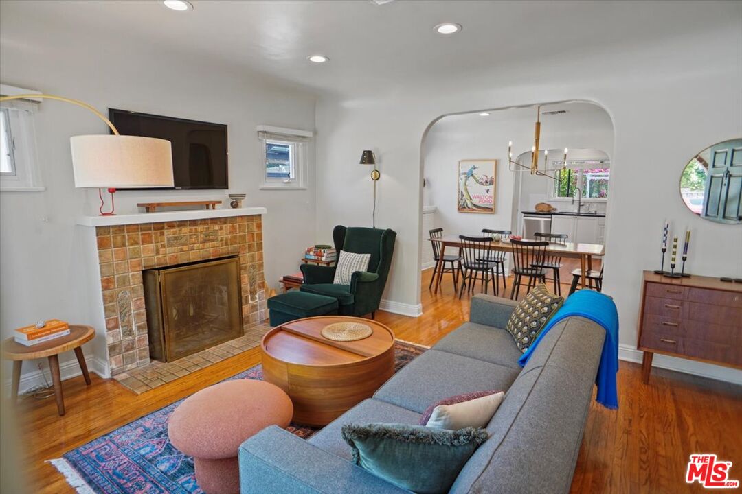 2400 Sylvan Lane Glendale, CA 91208 - Photo 3 of 28 a living room with furniture fireplace and flat screen tv
