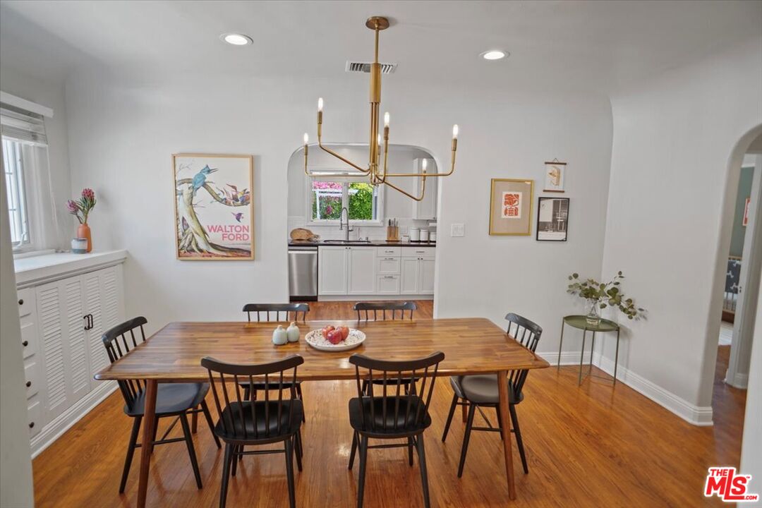 2400 Sylvan Lane Glendale, CA 91208 - Photo 5 of 28 a view of a dining room with furniture and wooden floor