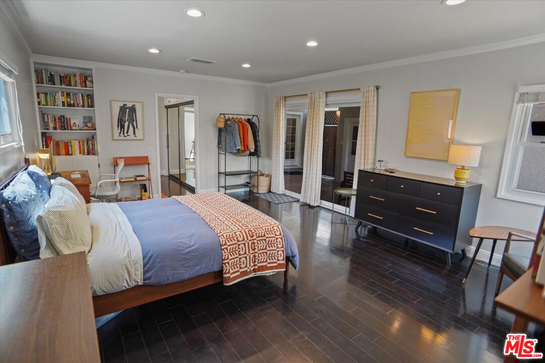 2400 Sylvan Lane Glendale, CA 91208 - Photo 9 of 28 a bedroom with a bed and dresser with wooden floor