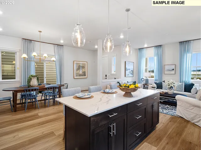 a kitchen with a sink stove and wooden cabinets