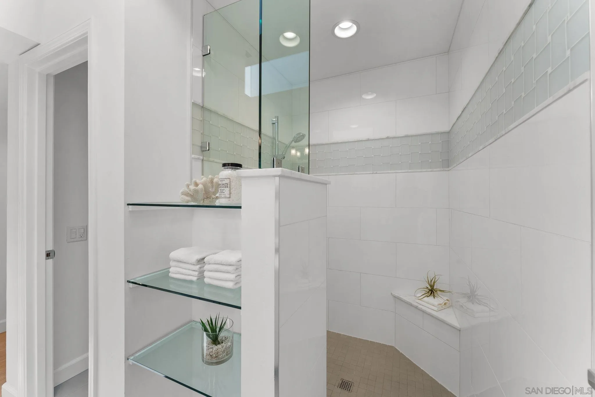 3127 Vista Rica Carlsbad, CA 92009 - Photo 13 of 25 a bathroom with a bathtub and a shower