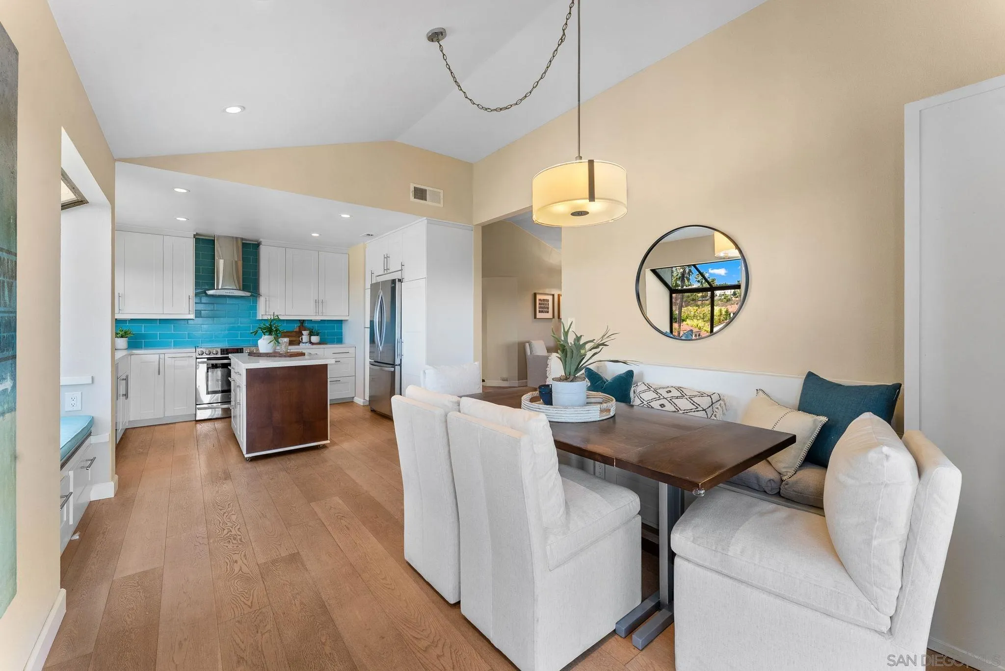 3127 Vista Rica Carlsbad, CA 92009 - Photo 8 of 25 a view of a dining room with furniture and a large window