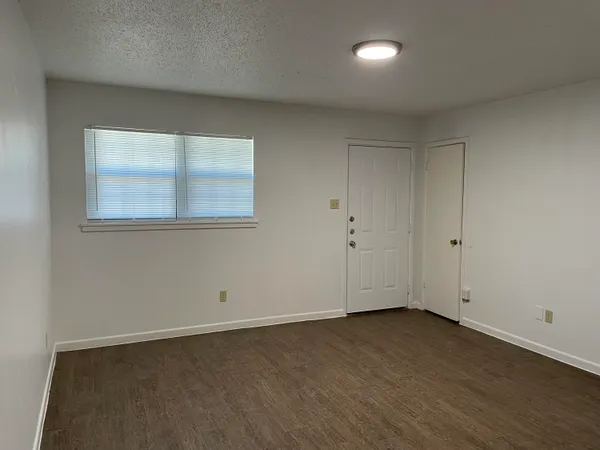 an empty room with a window