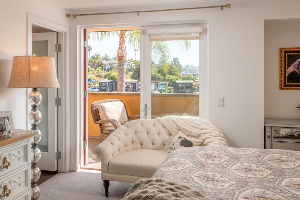 90 North Coast Highway 101, Unit 310 Encinitas, CA 92024 - Photo 13 of 24 a bedroom with a bed and a window
