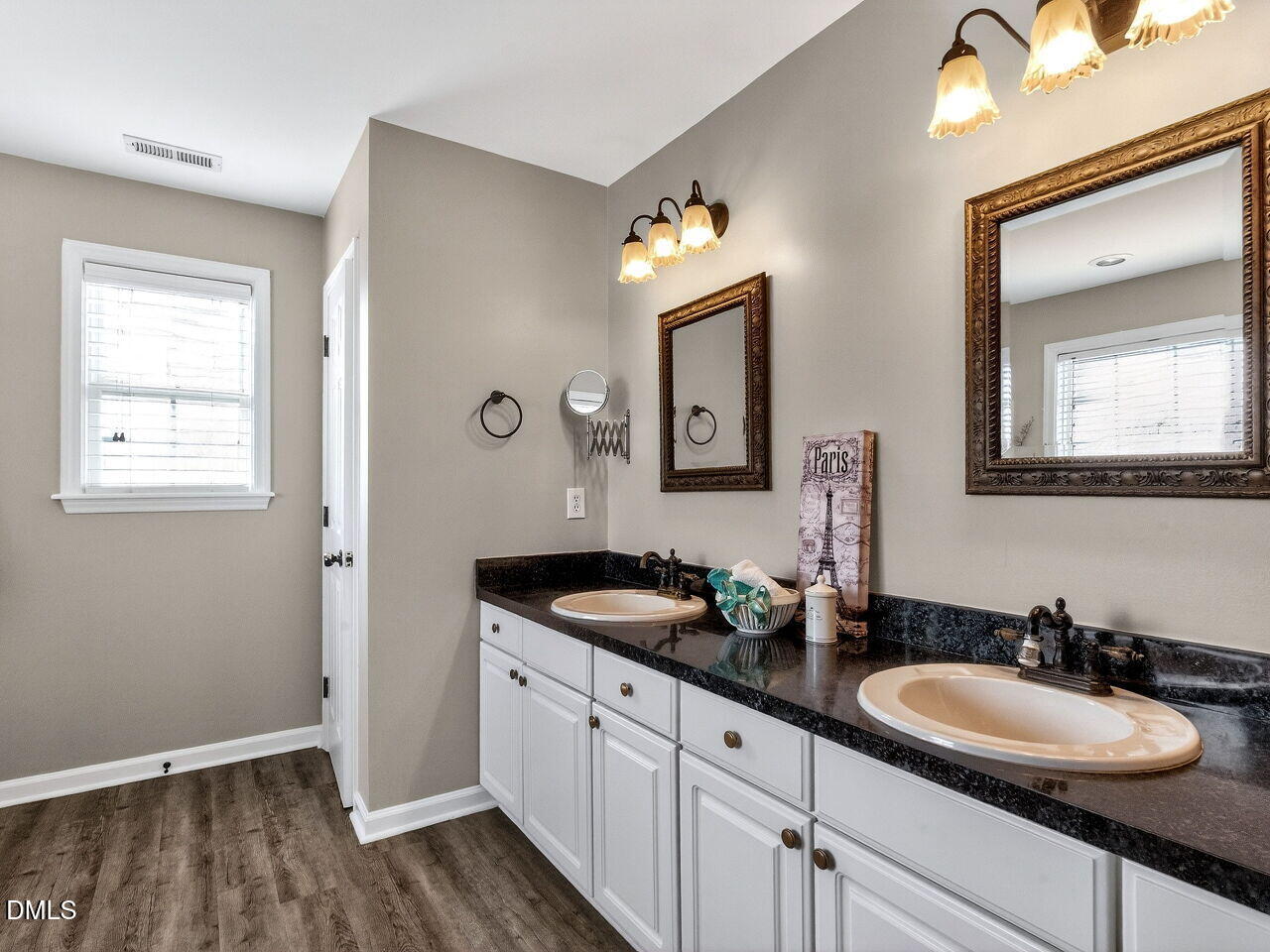 4500 Rivershyre Way Raleigh, NC 27616 - Photo 29 of 42 a bathroom with a granite countertop double vanity sink and a mirror