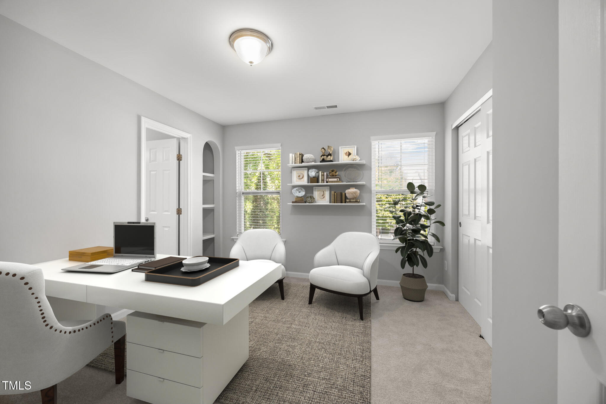 6626 Clarksburg Place Raleigh, NC 27616 - Photo 14 of 25 a living room with furniture and a window