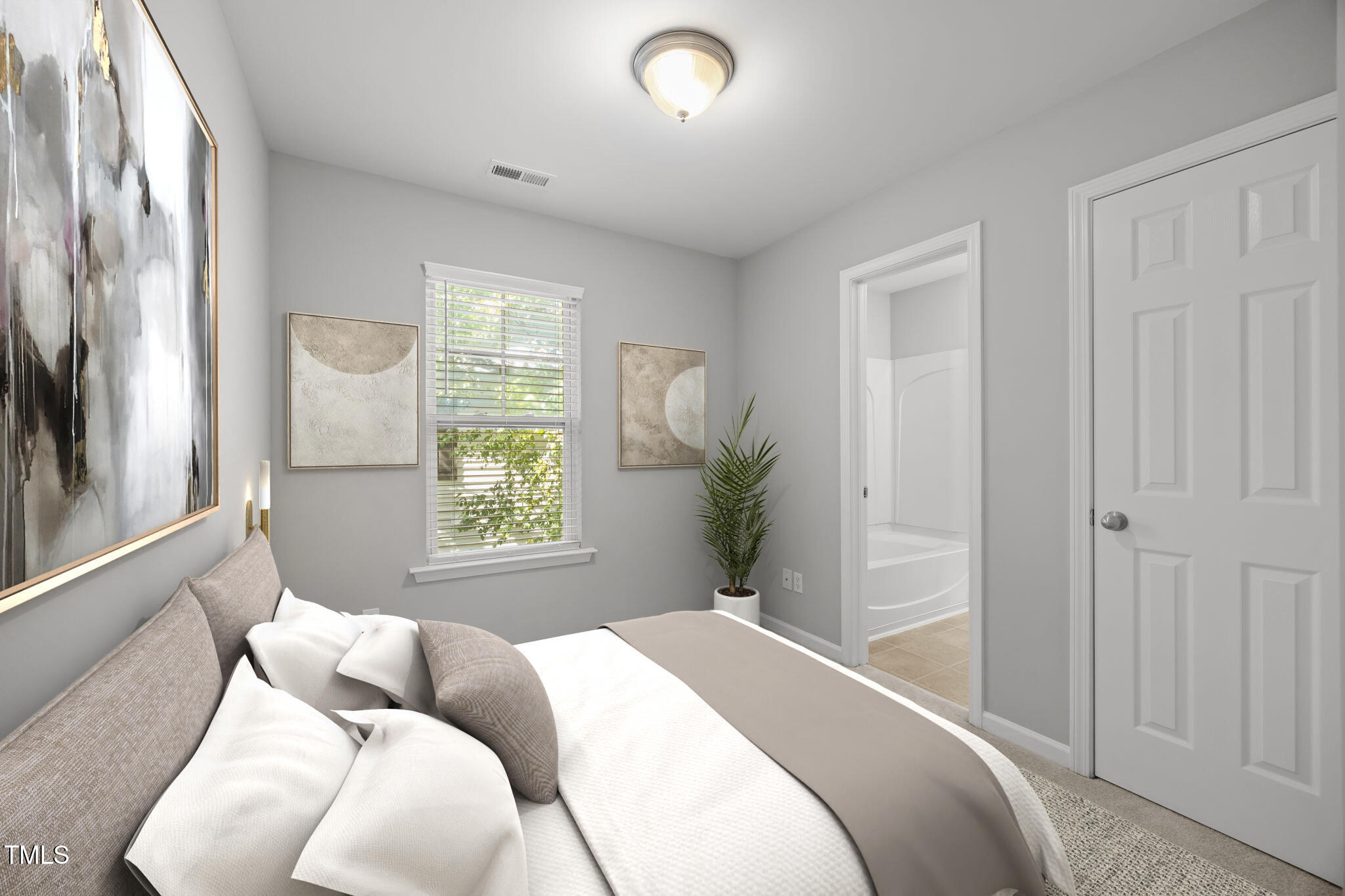 6626 Clarksburg Place Raleigh, NC 27616 - Photo 17 of 25 a bedroom with a bed and a window