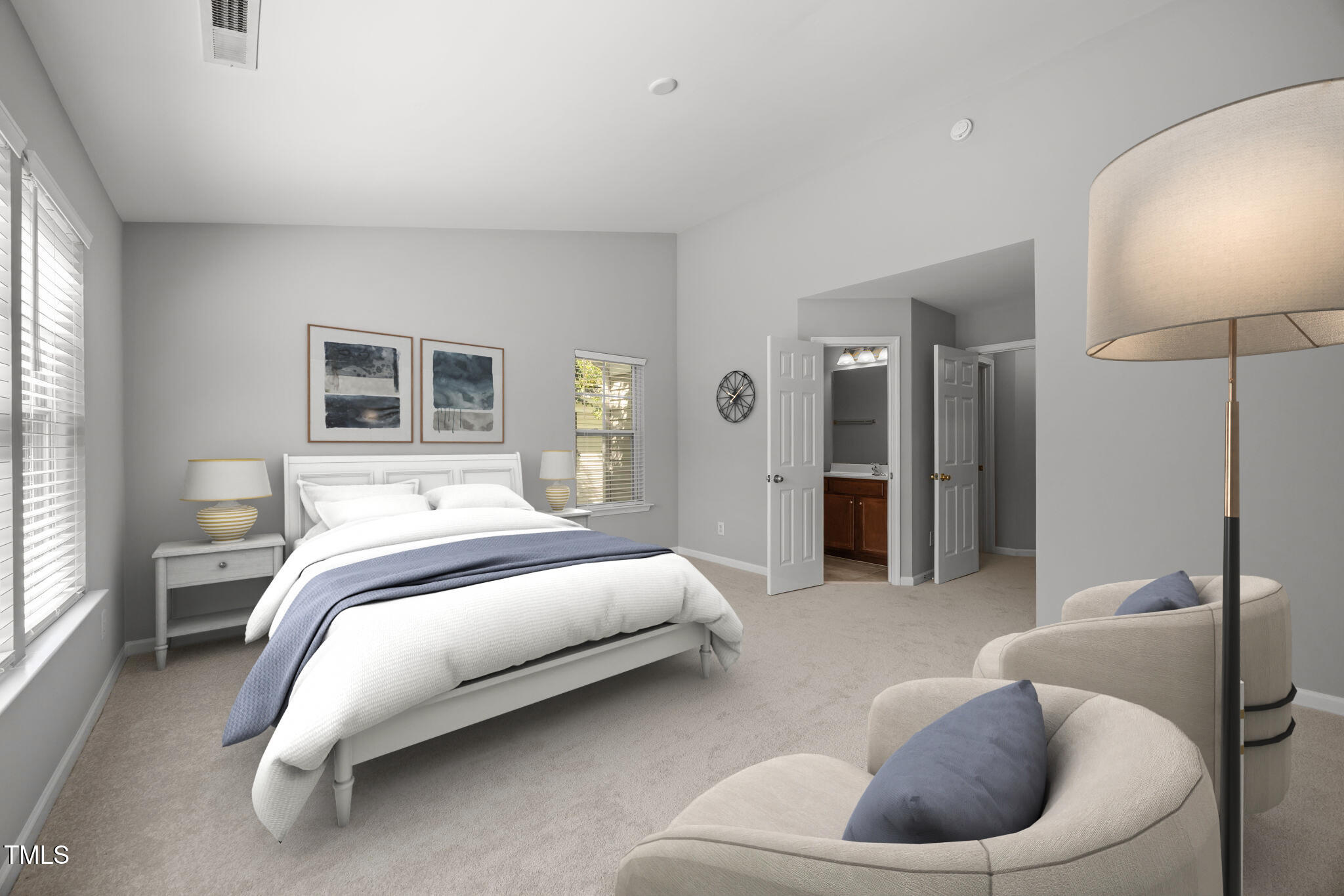 6626 Clarksburg Place Raleigh, NC 27616 - Photo 21 of 25 a spacious bedroom with a bed and a couch