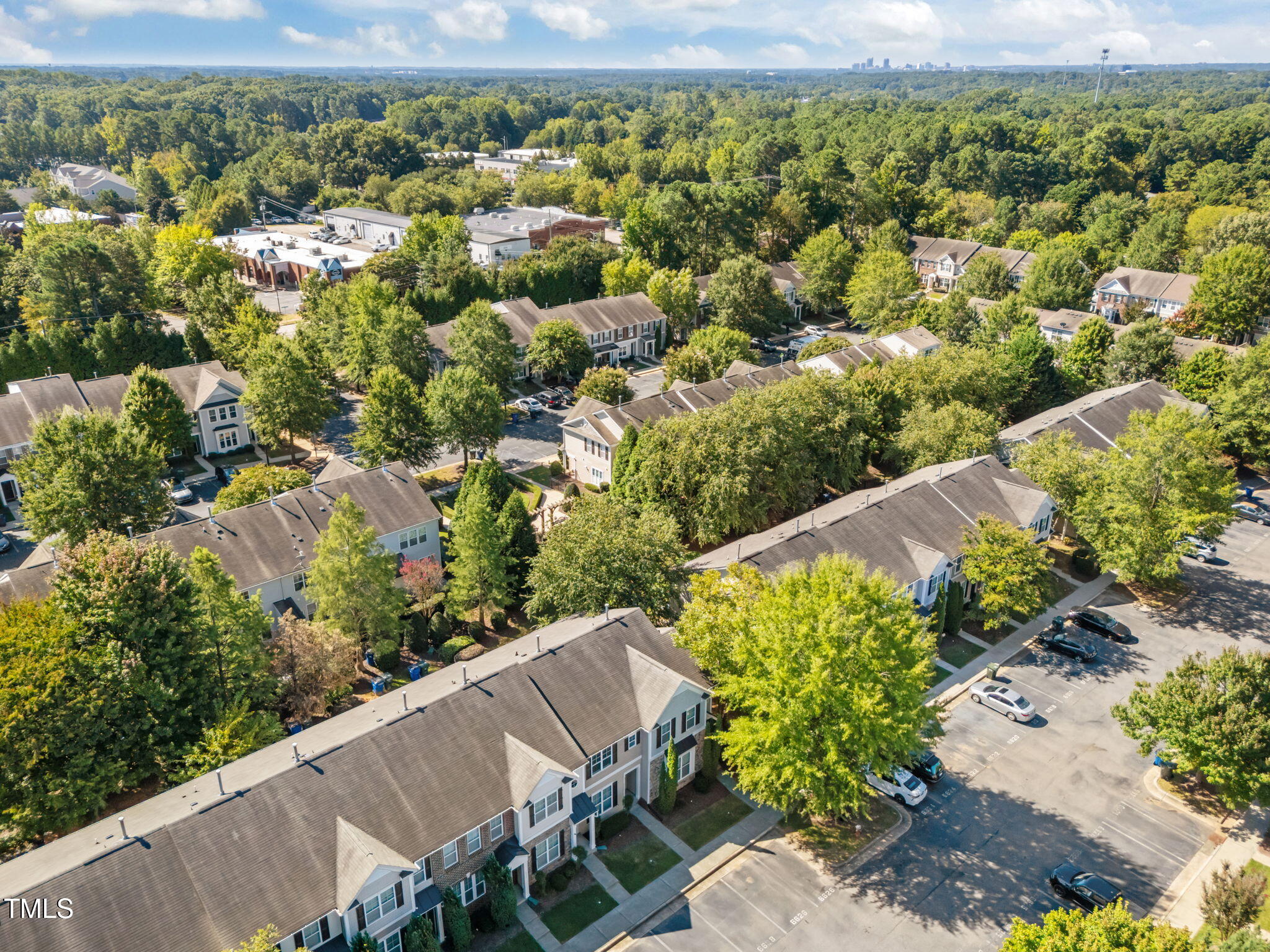 6626 Clarksburg Place Raleigh, NC 27616 - Photo 24 of 25 an aerial view of a house with a yard and lake view