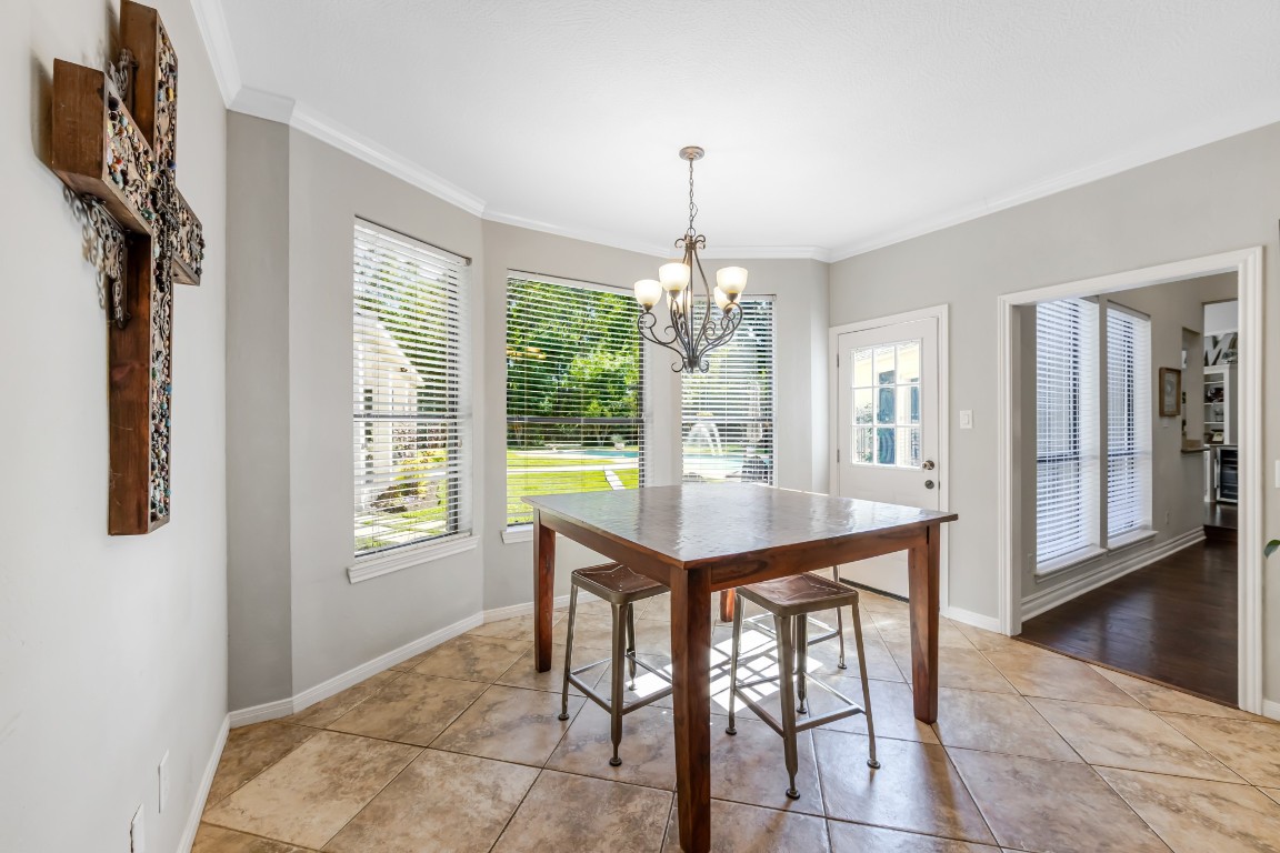 13303 Lost Creek Road Tomball, TX 77375 - Photo 24 of 50 a view of a dining room with furniture and window