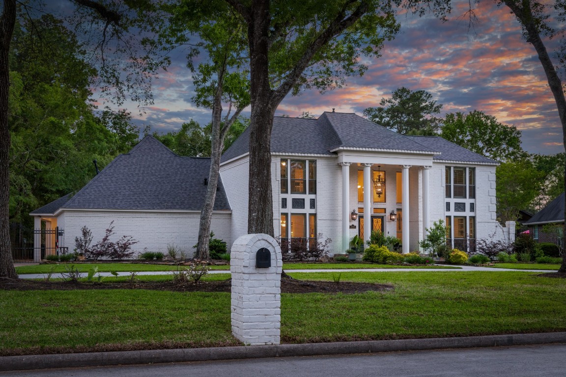 13303 Lost Creek Road Tomball, TX 77375 - Photo 5 of 50 a front view of a house with a yard