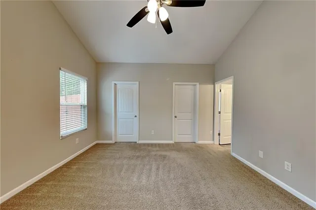 a view of an empty room and window