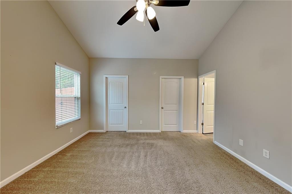 288 Stable View Loop Dallas, GA 30132 - Photo 7 of 19 a view of an empty room and window