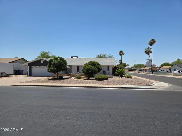 front view of a house with a street