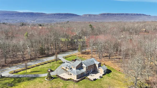 a view of swimming pool with a yard