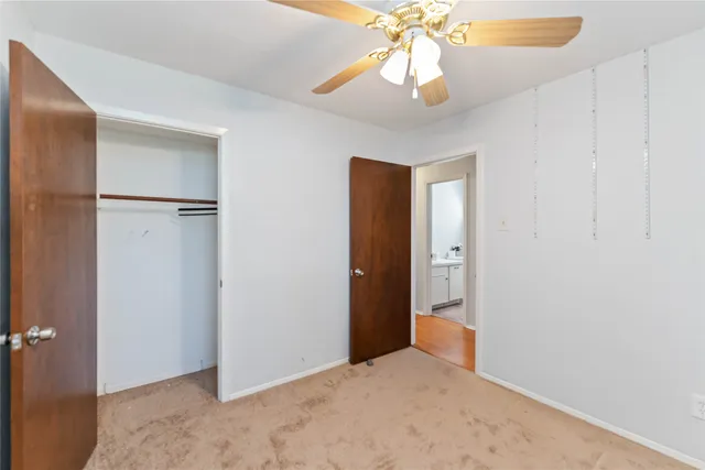 an empty room with a bathroom