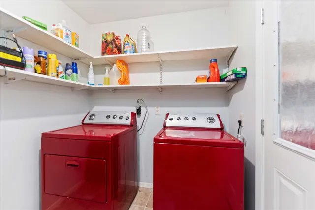 a utility room with dryer and washer