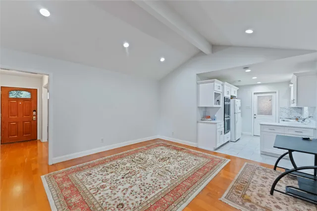 a living room with rug