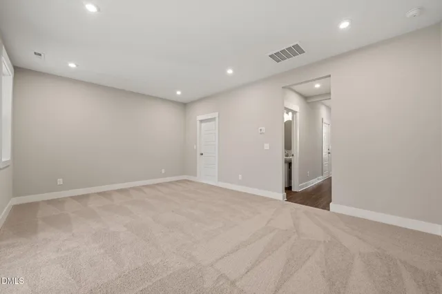 an empty room with an entryway