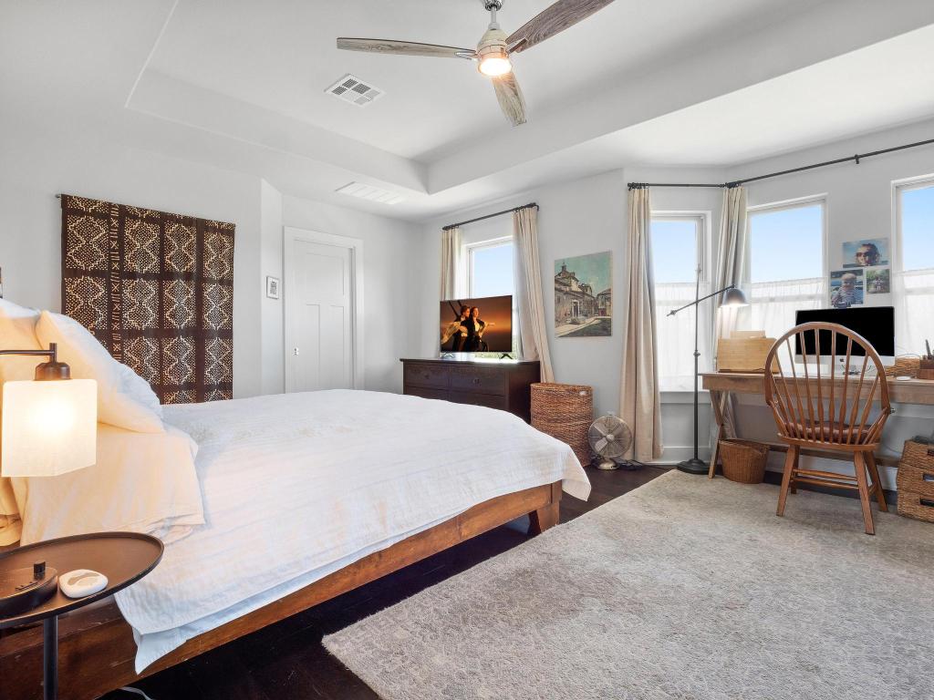 10103 Twin Lake Loop Dripping Springs, TX 78620 - Photo 20 of 32 Bedroom featuring a raised ceiling and ceiling fan