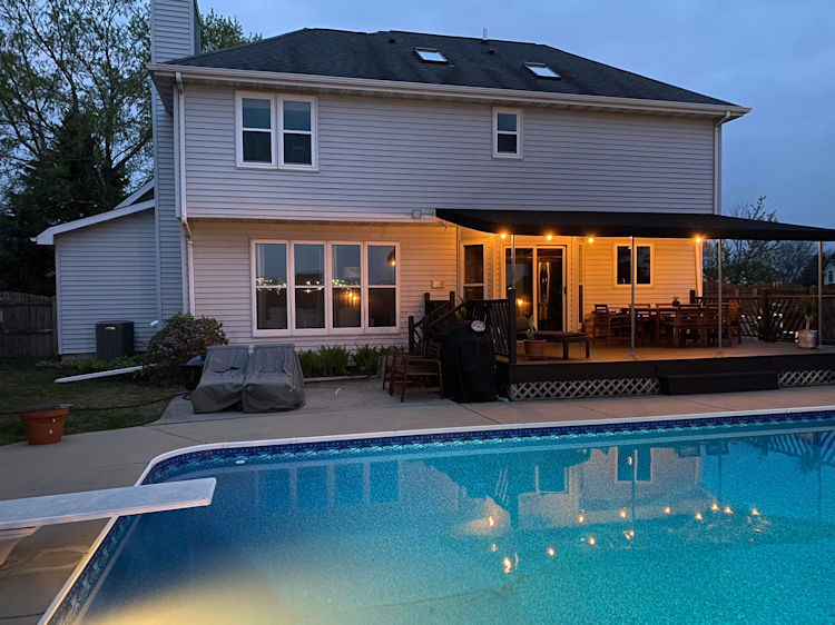 1311 Sunset Terrace Rochelle, IL 61068 - Photo 14 of 20 a front view of a house with swimming pool