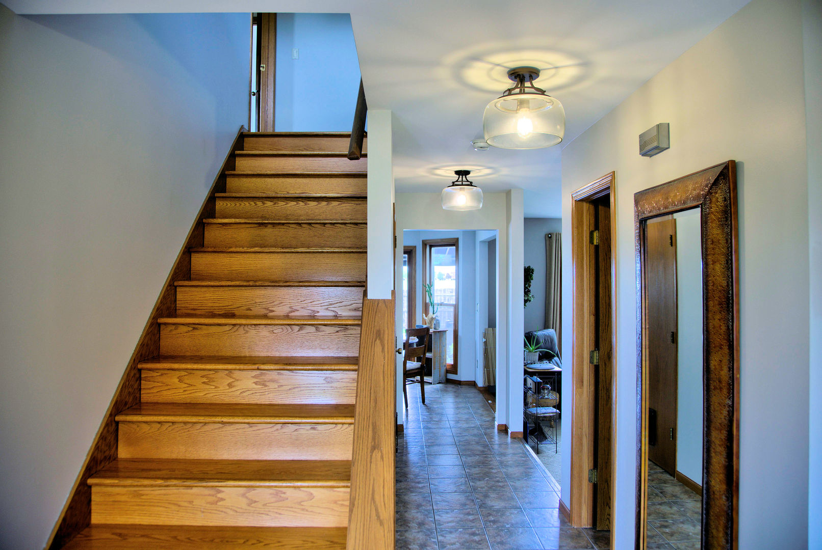 1311 Sunset Terrace Rochelle, IL 61068 - Photo 17 of 20 a view of entryway and hall with wooden floor