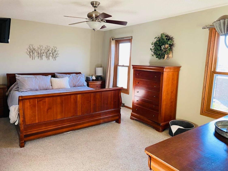 1311 Sunset Terrace Rochelle, IL 61068 - Photo 10 of 20 a bed room with a bed and a window