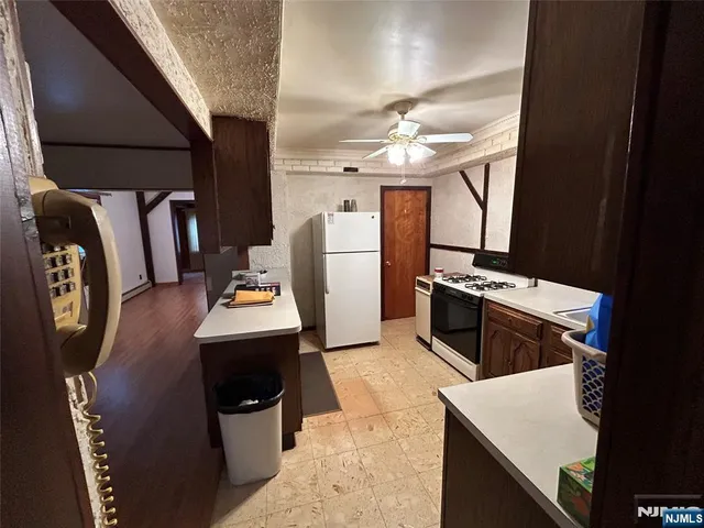 a bathroom with a sink toilet and mirror