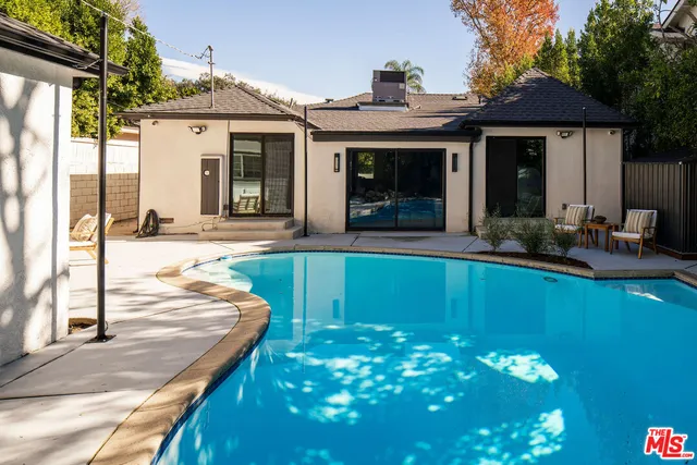 a view of a house with entrance gate