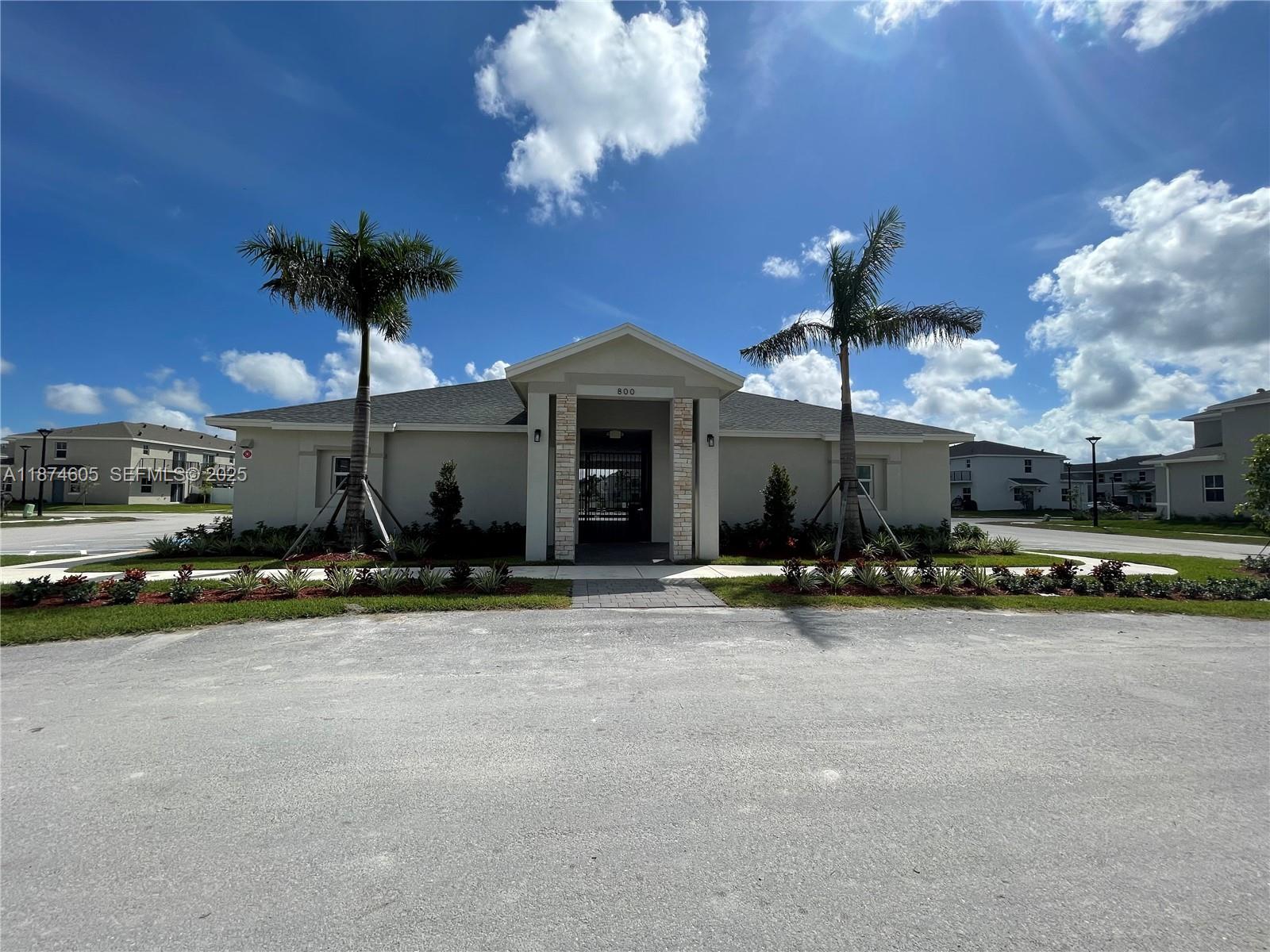 793 Southeast 19th Street Homestead, FL 33034 - Photo 11 of 13 a view of a house with patio swimming pool and outdoor space