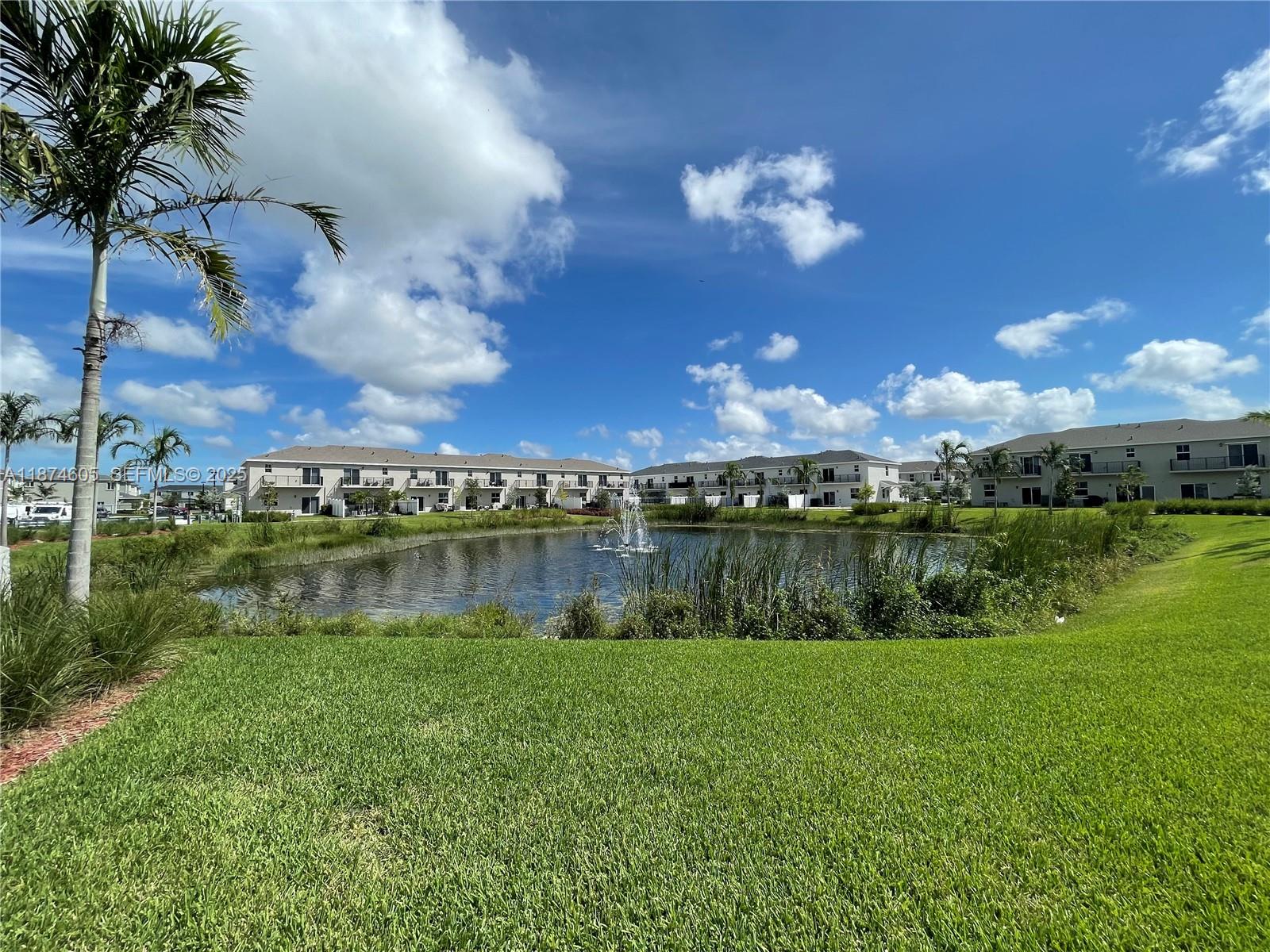 793 Southeast 19th Street Homestead, FL 33034 - Photo 10 of 13 a view of a lake from a yard