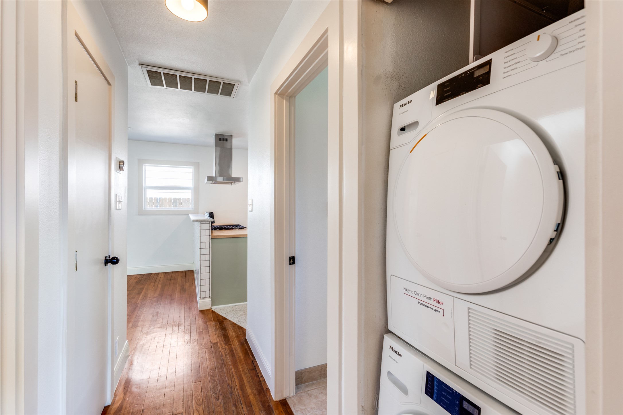 2012 Payne Avenue, Unit A Austin, TX 78757 - Photo 23 of 35 a view of a hallway with wooden floor and entryway