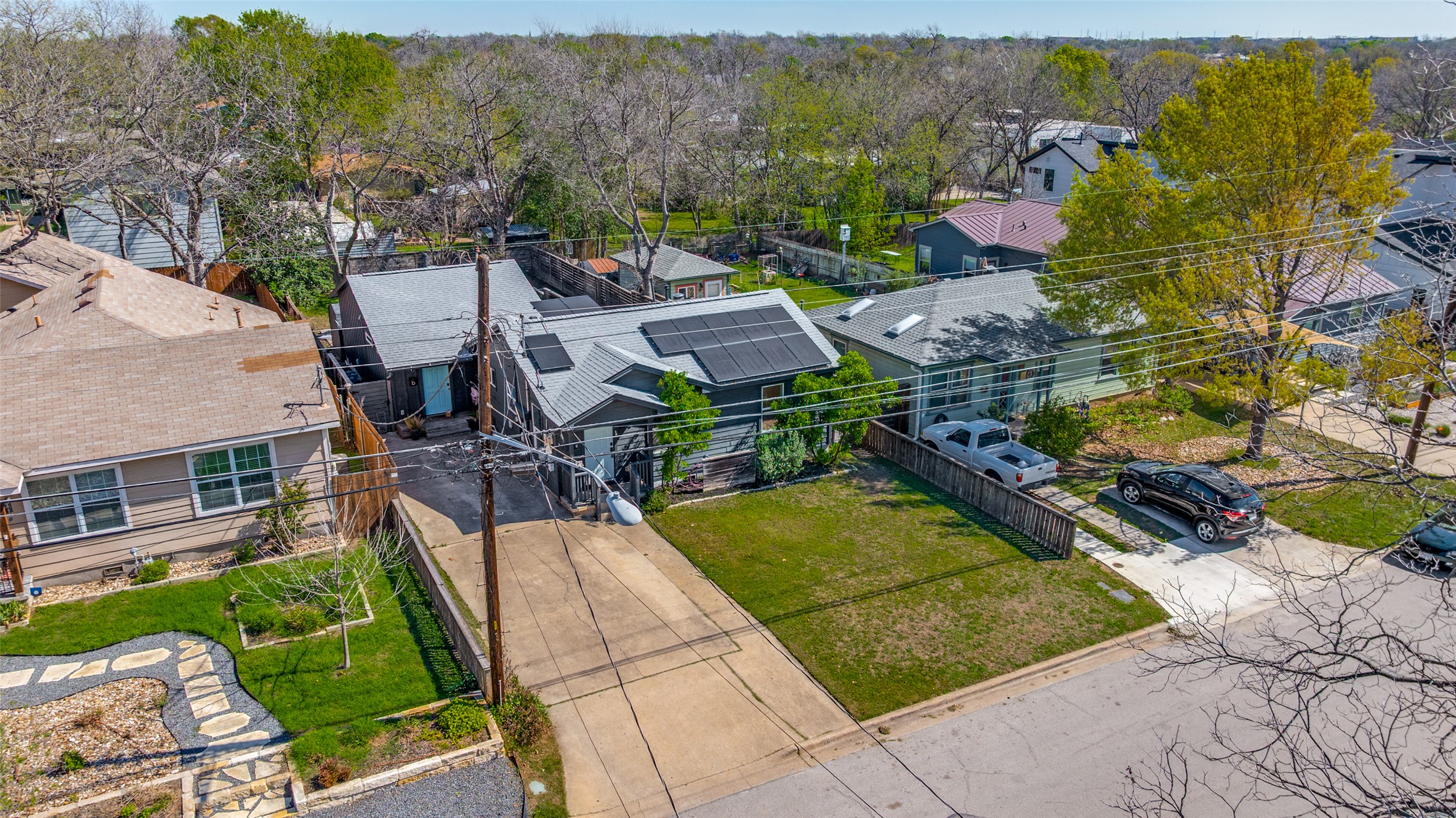 2012 Payne Avenue, Unit A Austin, TX 78757 - Photo 31 of 35 an aerial view of a house with a yard and lake view