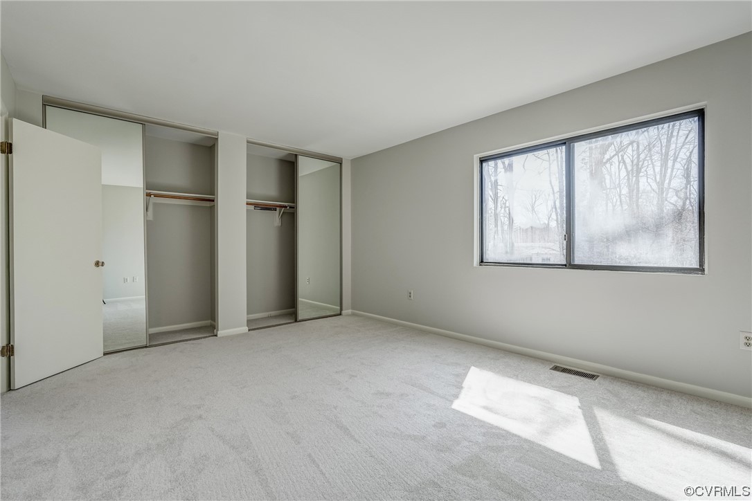 11805 South Briar Patch Drive Midlothian, VA 23113 - Photo 16 of 35 an empty room with windows and closet