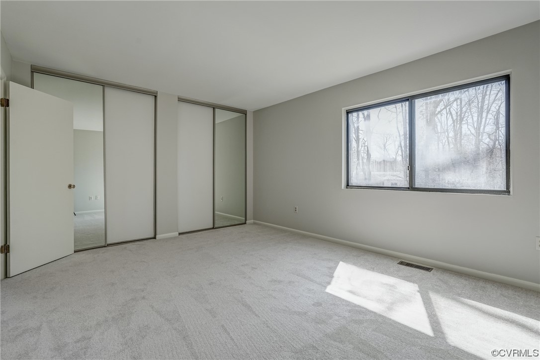 11805 South Briar Patch Drive Midlothian, VA 23113 - Photo 18 of 35 a view of an empty room with a window