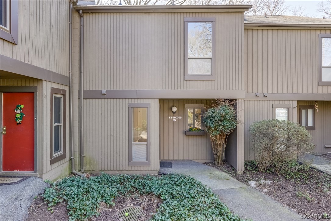 11805 South Briar Patch Drive Midlothian, VA 23113 - Photo 2 of 35 a front view of a house with garden