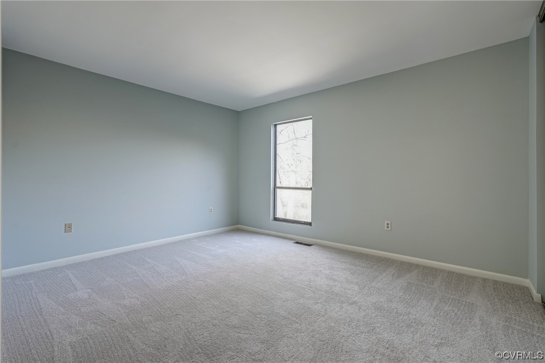 11805 South Briar Patch Drive Midlothian, VA 23113 - Photo 24 of 35 an empty room with windows