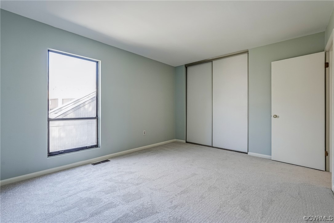 11805 South Briar Patch Drive Midlothian, VA 23113 - Photo 25 of 35 an empty room with windows and closet