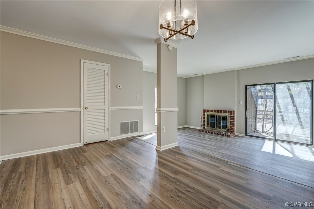 11805 South Briar Patch Drive Midlothian, VA 23113 - Photo 9 of 35 a view of an empty room with wooden floor and a window