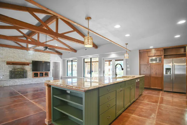 a view of a hall with dining area