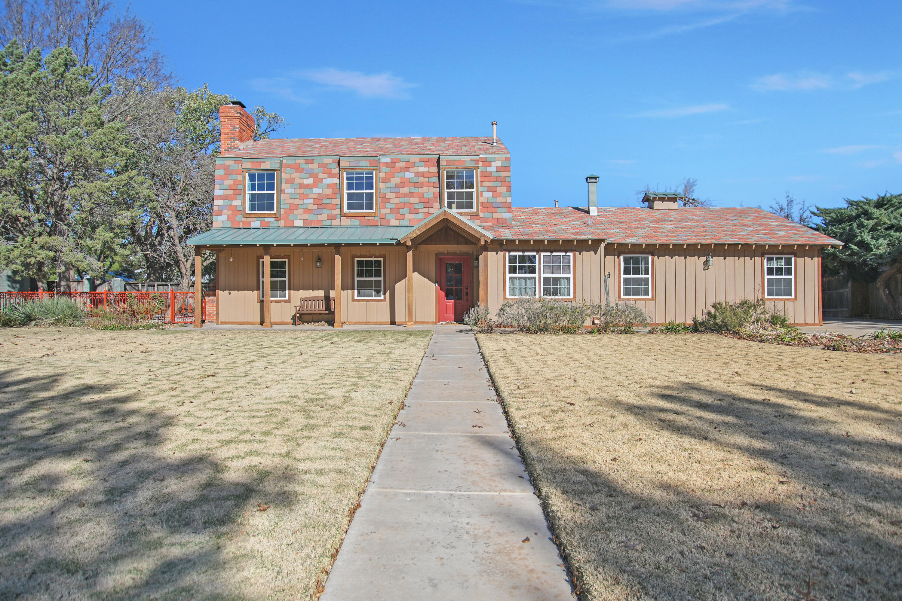 5412 20th Street Lubbock, TX 79407 - Photo 2 of 83 a front view of a house with a yard